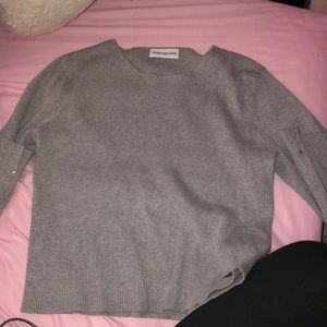 Grey long sleeve crop top from Calvin Klein.